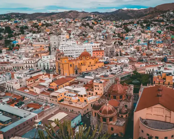 Colourful hillside houses and domed churches in Guanajuato, Mexico
